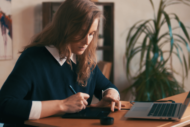 woman at computer writing_0